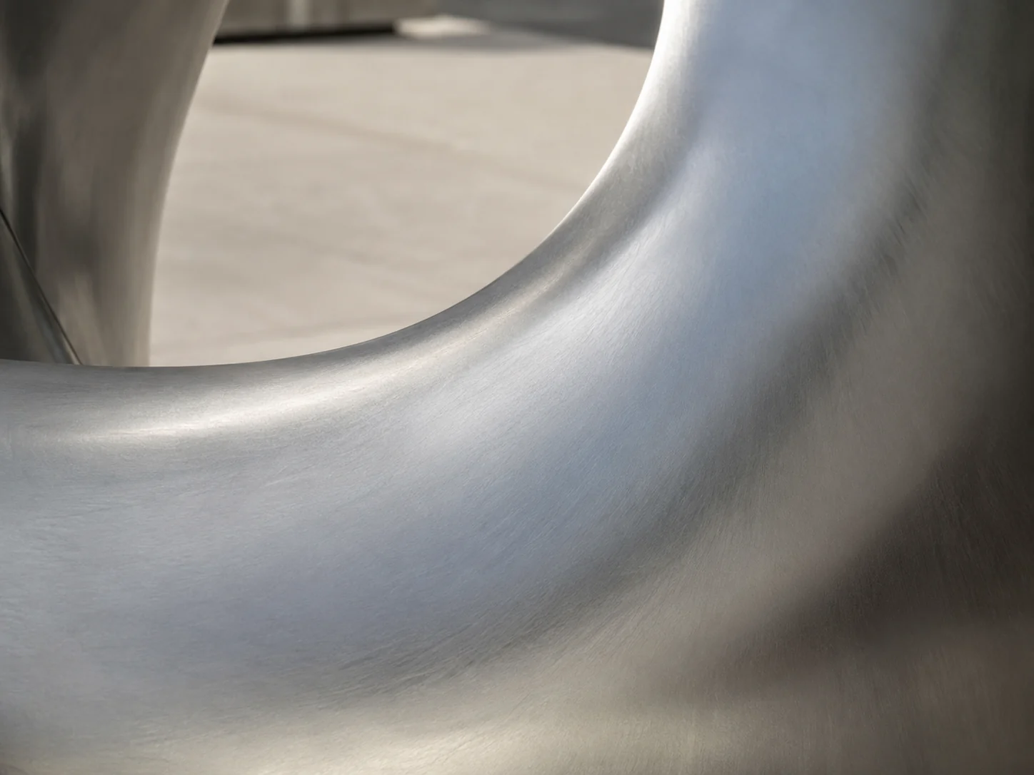 Satin stainless steel sculpture surface finish